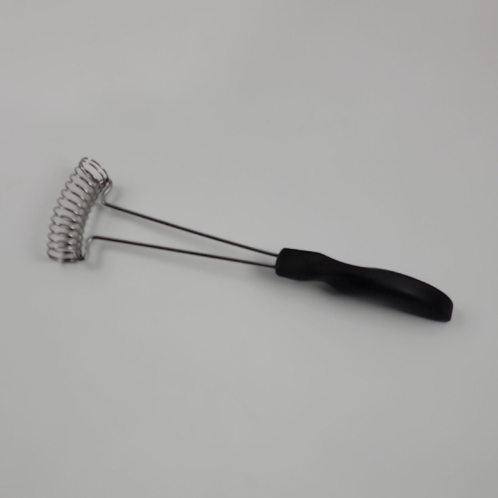 Cutco Model 1060 Mix-Stir Whisk, featuring a versatile coil design for mixing